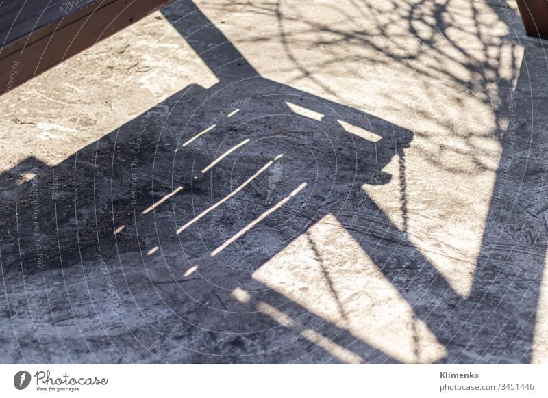 Old concrete wall, natural texture. Light background. The shadows. stone construction gray smooth textured surface new aged rural abstract antique old board