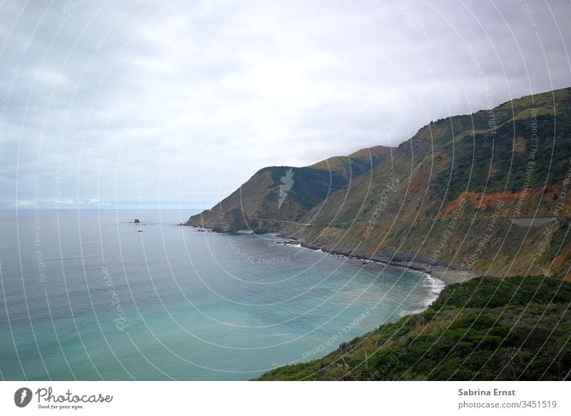 Coastal panorama of the Highway Number One Motorway number one Mountain Hill Bad weather cloudy Rough Ocean Water outlook view Nature Landscape Horizon Gray