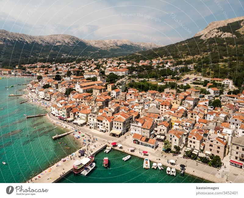 Aerial panoramic view of Baska town, popular touristic destination on island Krk, Croatia, Europe baska krk sea croatia city building harbor water summer