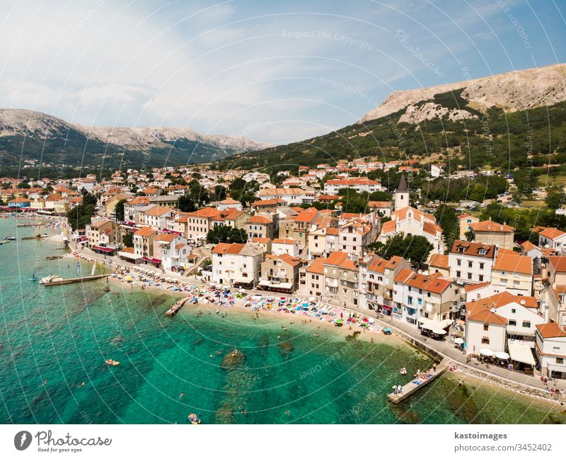 Aerial panoramic view of Baska town, popular touristic destination on island Krk, Croatia, Europe. baska krk sea croatia city building harbor water summer