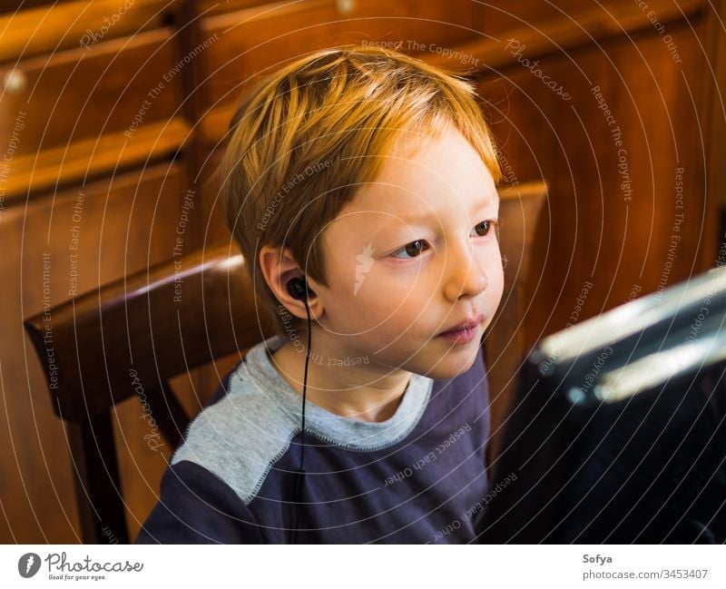 Little pre-school girl learns to solve puzzles online and plays educational  games on tablet at home - a Royalty Free Stock Photo from Photocase