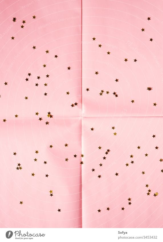 Pink paper background with stars and lights pink coral sparkle christmas new year magic texture geometry abstract art concept backdrop modern copy space mockup