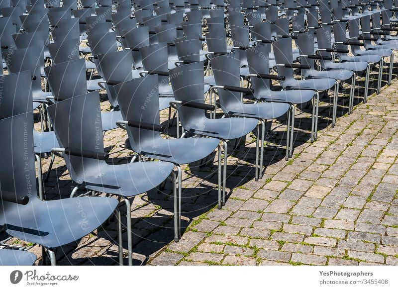Empty chairs in rows. Open-air theater seats Germany abandoned aged aligned audience auditorium blue business canceled city classic comfort comfortable concert