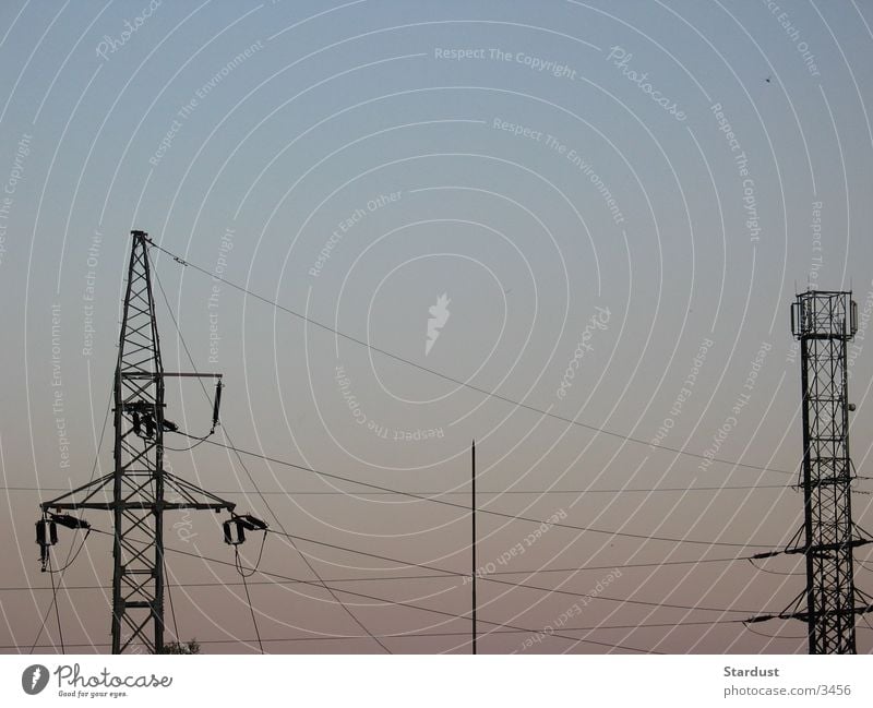 Voltage is in the air Electricity Electricity pylon Twilight Electrical equipment Technology