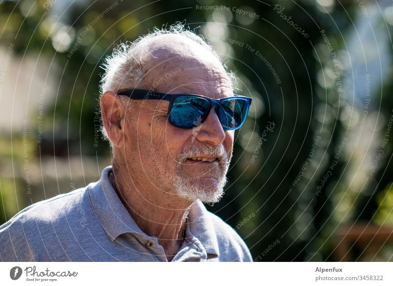 old | and grey in places Senior citizen Old man Male senior Grandfather Human being Masculine Exterior shot portrait Shallow depth of field 60 years and older