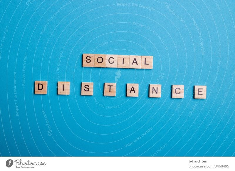 Scrabble letters "SOCIAL DISTANCE" on blue background Social distance social social distancing Letters (alphabet) Blue Studio shot Neutral Background