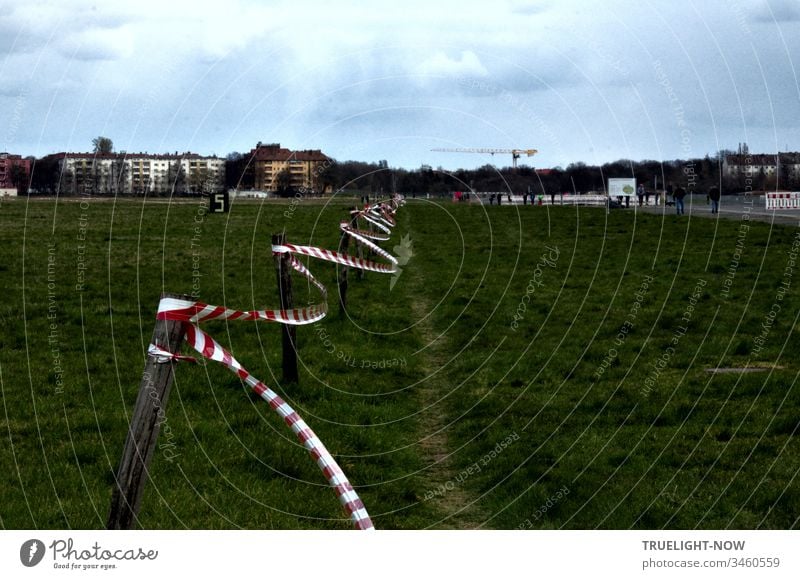 Corona Thoughts | The pandemic makes a lot of things flutter: here is a barrier tape at Berlin's former Tempelhofer Feld airport covid-19 Corona virus