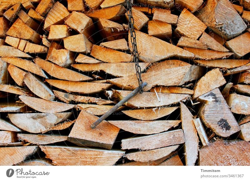 Cut wood and a metal thing Wood boards Firewood Stack of wood Supply Forestry Tree Tree trunk Environment Deserted