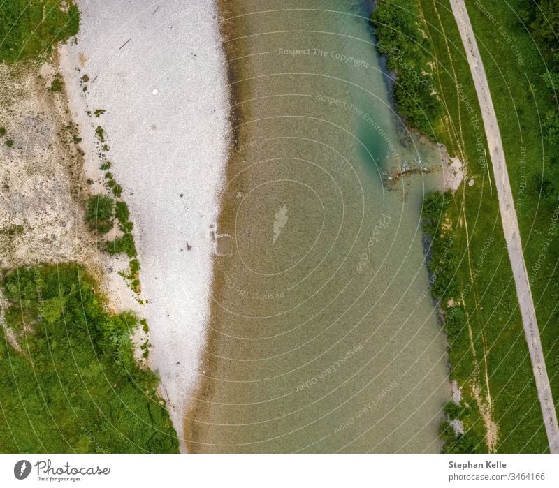 Top view at a river with with sand at the shore and green vegetation. top view drone water white pure nature Landscape Beautiful clear seascape copter