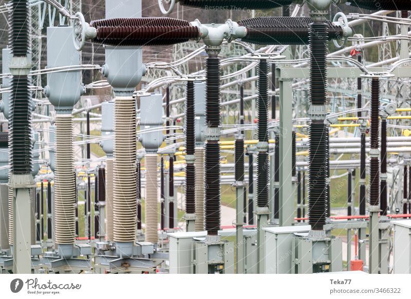 modern high-voltage substation background high voltage high voltage substation energy electricity steel amp green grey yellow sharp blur high voltage pylon