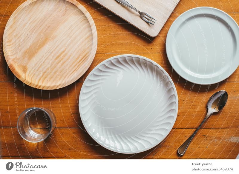 Download Flat Lay Of Three Plates And Some Cutlery A Royalty Free Stock Photo From Photocase