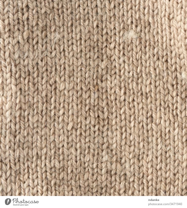 Fragment Of Knitted Fabric From Light Brown Wool Of A Sheep A Royalty Free Stock Photo From Photocase