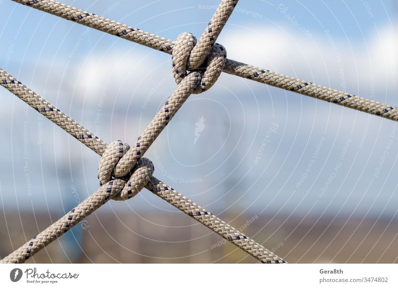 many ropes and one big knot close up abstract abstract background affiliation apposition attachment cable close-up combination communications compound