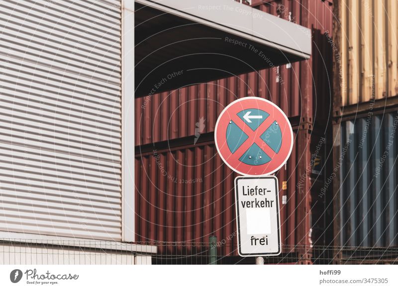 Entry to container terminal - no parking - free delivery traffic Road sign free on delivery Prohibition sign Clearway Container terminal red container Port City