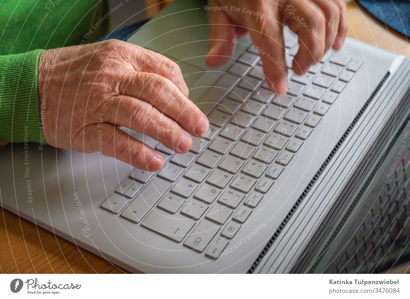 Old man with laptop: contact with the outside world Pensioners communication Internet internet connection Loneliness Quarantine coronavirus Corona virus