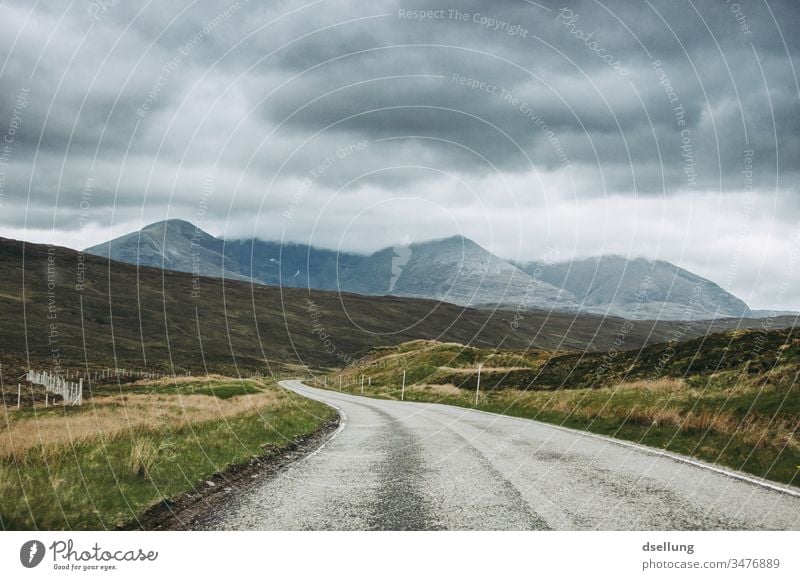 A road that winds through the Scottish Highlands towards a mountain Panorama (View) Day decelerated deceleration Target Lanes & trails Vacation & Travel Calm