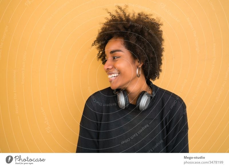 Young Black Woman With Curly Hair In Yellow Dress And With Styles Attitude  Laughing Happy Stock Photo - Download Image Now - iStock