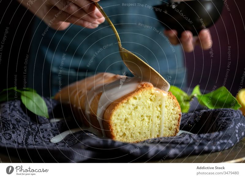 Anonymous person preparing homemade lemon cake pastry baking confectionery dough kitchen gourmet cloth fruit sugar cooking table natural recipe culinary rustic