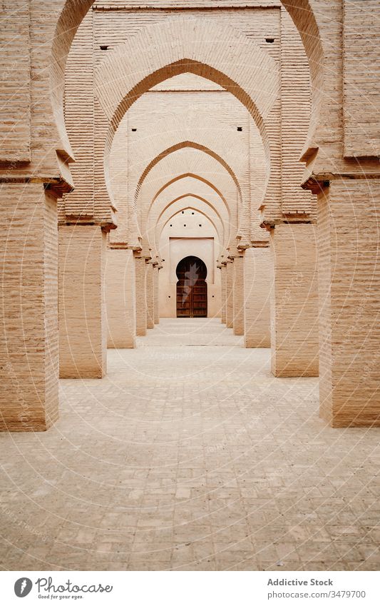 Classic Moroccan gallery with columns and arches architecture ancient old aged stone ornament building morocco door culture historic tradition heritage antique