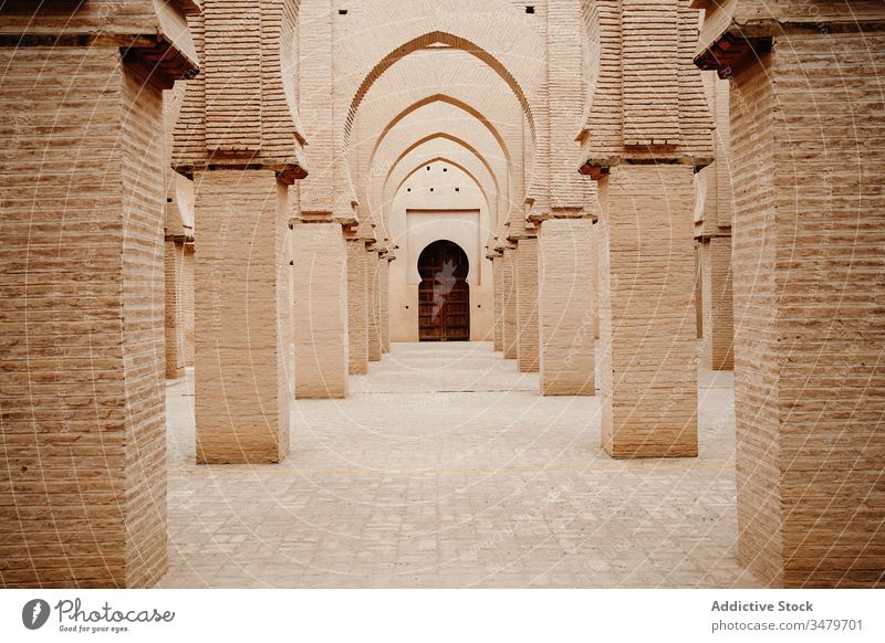 Classic Moroccan gallery with columns and arches architecture ancient old aged stone ornament building morocco door culture historic tradition heritage antique
