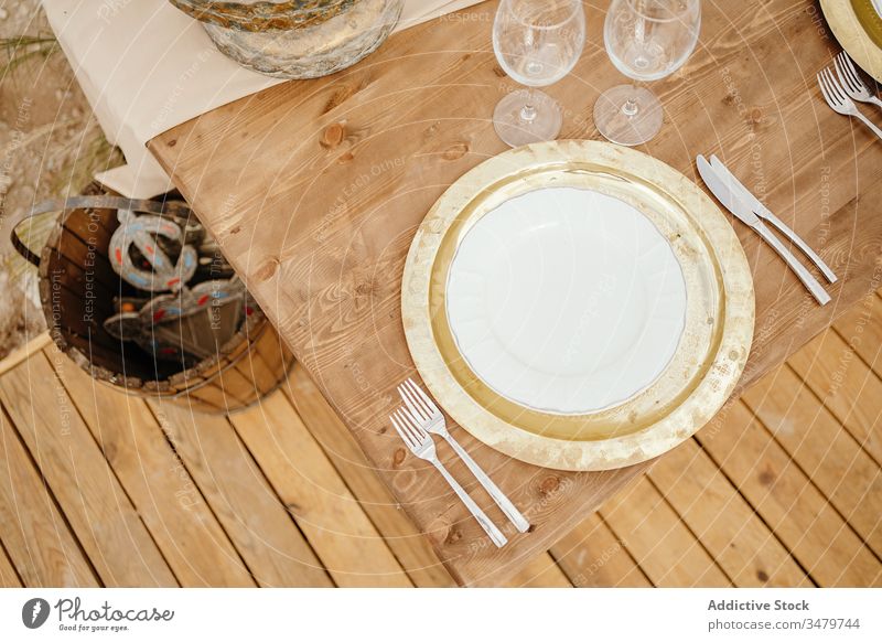 Festive table and traditional oriental seats decor festive arabic arrangement morocco plate wooden serve design decoration elegant event dinner ceremony