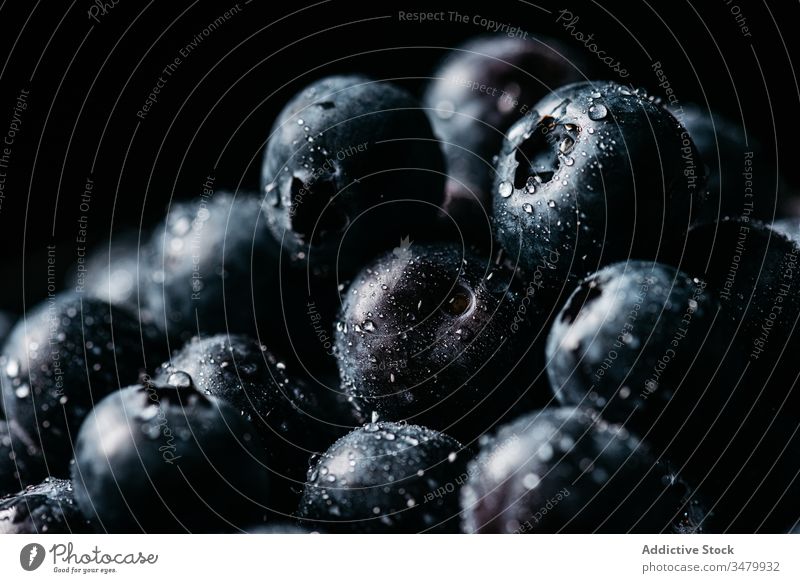 Fresh blueberries on wooden bowl on table blueberry dark food fresh natural ripe delicious tasty ingredient healthy nutrition vegetarian vitamin raw cuisine