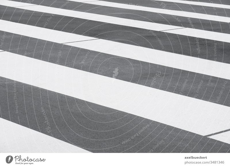 close-up zebra crossing or crosswalk background asphalt road marking street stripe stripes striped stripy gray grey tarmac lined abstract pattern empty nobody