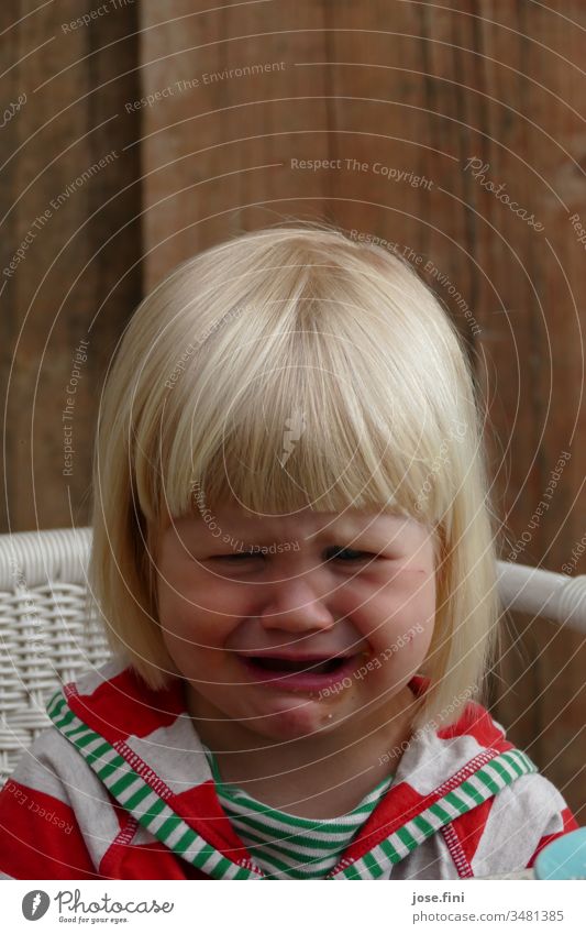 But I want Girl Grimace fringe hairstyle Portrait photograph Natural little girl Child Face Infancy Sadness Cry wounded gloom Cute Parenting Wood Sweet Day