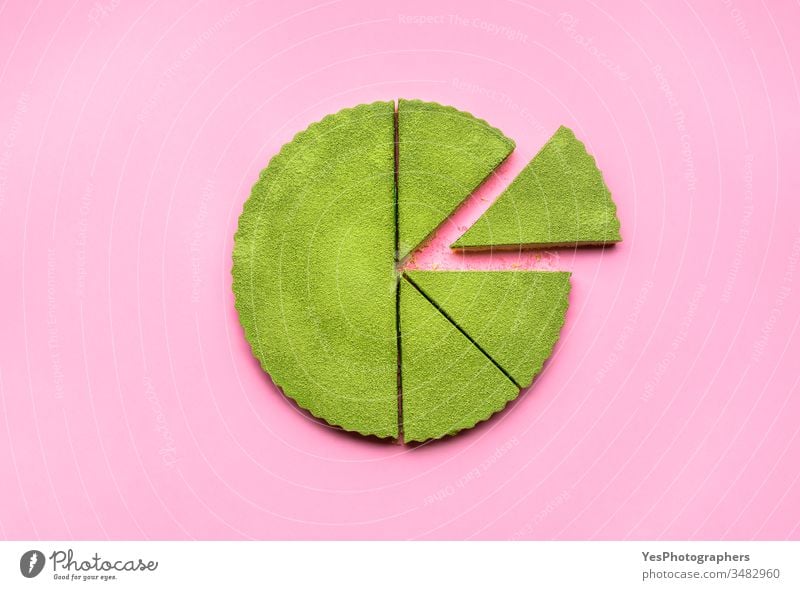 Matcha tart cut in slices. No baking cheesecake. Matcha dessert above view colorful confectionery creamy cutout delicious equal portions flat lay food