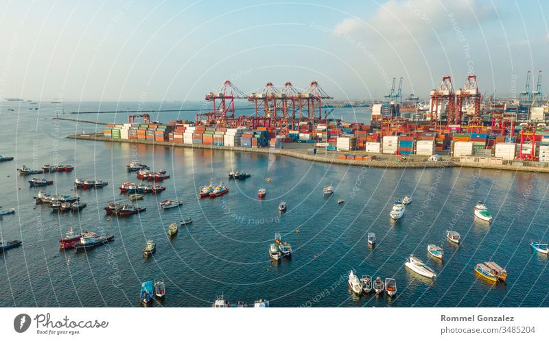 View of dock and containers in the port of Callao, Lima / Peru drone view aerial photography aerial view freighters carrying unloading by-ship platform