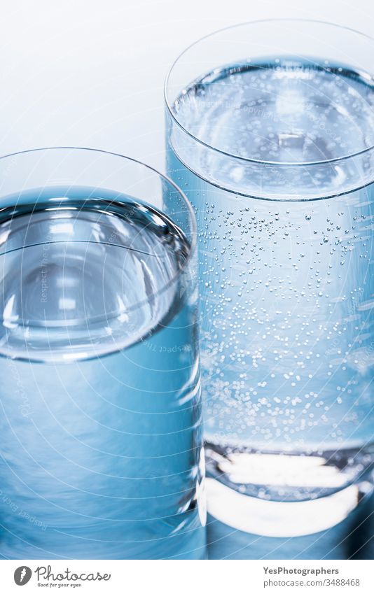 Glasses of water close-up. Tonic and mineral water 2 beverage blue background bubbles classic cold drink cold water cool details diet drinking glass drinks
