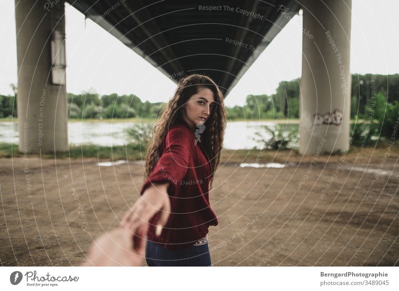 Girl with curly hair Bridge Hand girl long hair Beautiful