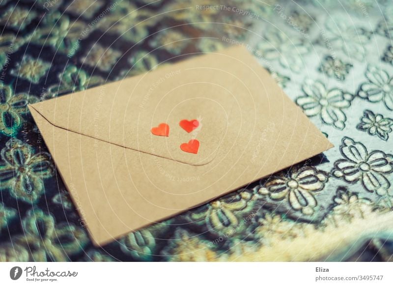 Photo with red heart will be sent in an envelope - a Royalty Free