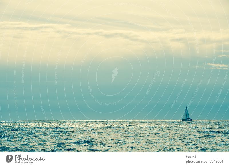 be small Nature Water Weather Beautiful weather Ocean Navigation Sailboat Sailing ship Blue Watercraft Heaven Clouds elemental Waves Loneliness Challenging Calm