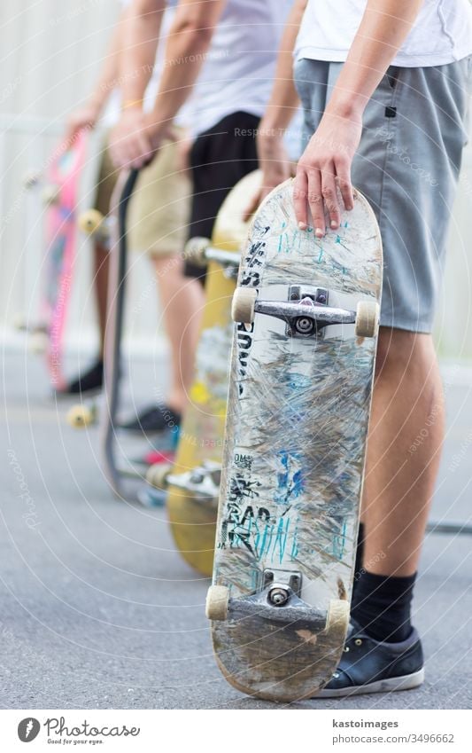 Boys skateboarding on street. Urban life. skater people outdoor action skateboarder extreme active skating practice dynamic energy young athletic fun sneakers