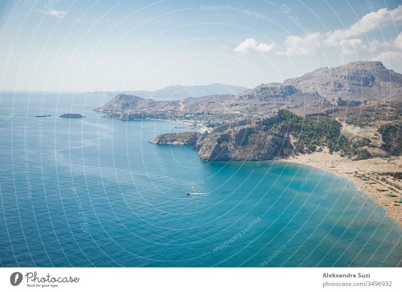 Panoramic top view of Tsampika beach, mountains and blue sea, Rhodes island, Greece. sunny weather. aerial aerial view bay beautiful beauty boat coast coastline