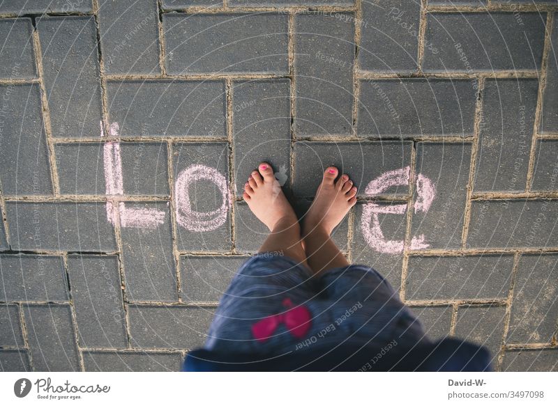 Love - child and love Child Stand creatively writing Word foot Cute With love Sweet Chalk Ground visualization Bird's-eye view Letters (alphabet) Colour photo