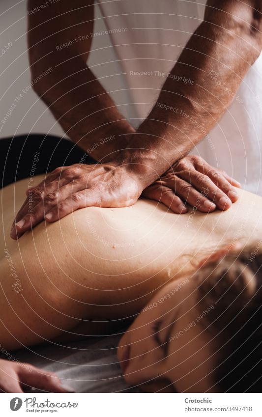 Reiki session alternative therapies. Hands transmitting energy on the back aromatherapy arthritis being bodycare bone chiropractor clinic cosmetic dayspa doctor