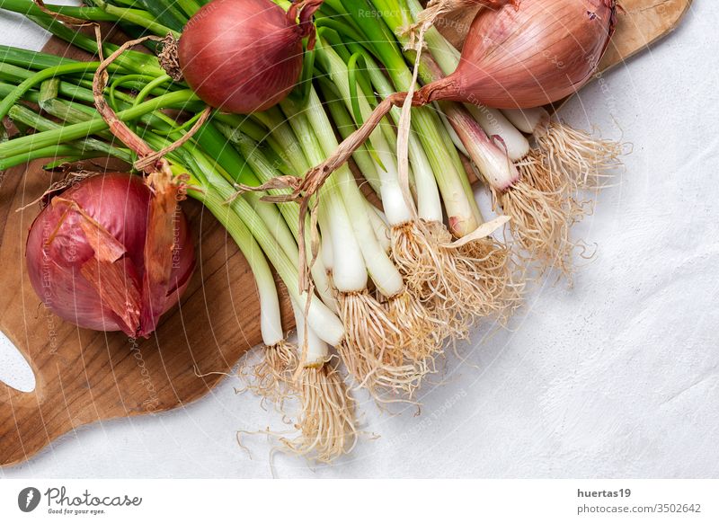 Fresh red and white onions on white background food vegetable ingredient natural healthy food fresh vegetarian vegan organic group raw plant nutrition bulb