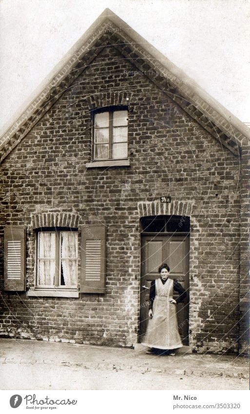 Grandma her little house Post-war period Past Nostalgia Memory Analog Front door House (Residential Structure) Grandmother Life Old Smock Apron Stand