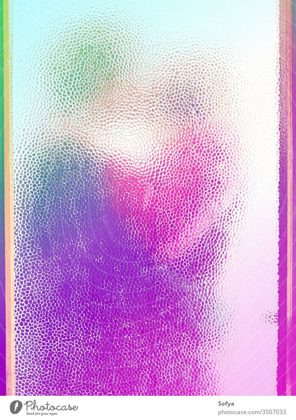 Couple hugging behind closed door glass window couple woman girl in love hugs cinema story neon light gradient color arms kiss passion art voyerism through