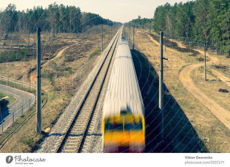 Electric train rides through the forest background tree retro vintage summer nature green rail railway track transport transportation travel outdoor railroad