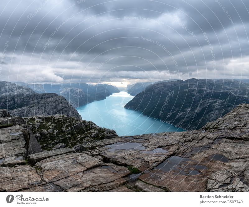 The Preikestolen in the evening in Norway Exterior shot Colour photo Fjord Rock Mountain Hiking Sunset Sky Nature Environment Clouds Sunrise Beautiful weather