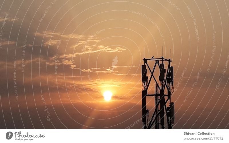 Telecommunication tower in India at the beautiful morning sunrise moments Antenna background Beautiful scenery Blue broadcast Broadcasting station