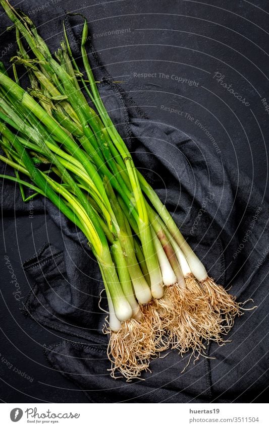 Fresh red and white onions on dark background food vegetable ingredient natural healthy food fresh vegetarian vegan organic group raw plant nutrition bulb green