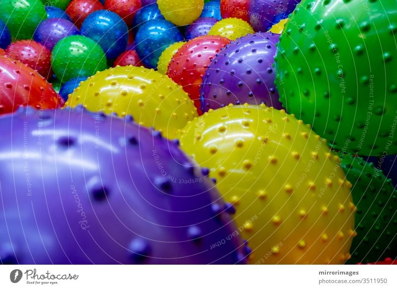 Group Of Clustered Bumpy Colorful Rubber Plastic Air Balls In A Big Kids Play Fun Room A Royalty Free Stock Photo From Photocase