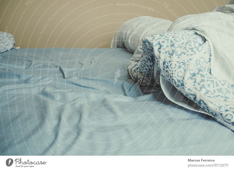 Unmade Bed Sheets And Blankets Open A Royalty Free Stock Photo From Photocase