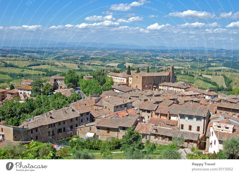 Aerial view of a small town in Tuscany, Italy, in a sunny day tuscany architecture italy romantic historical building landmark tourism travel renaissance