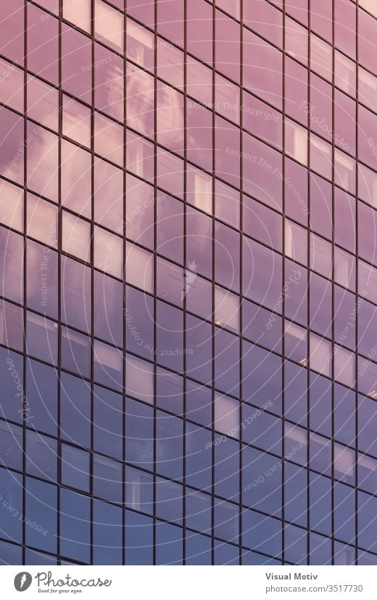 Afternoon lights reflected on the glass facade of an office building abstract abstract background abstract photography afternoon apartment architectonic