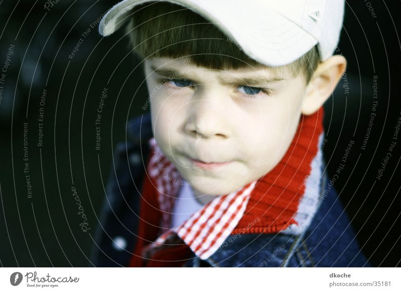 What do you want? What do you want? Child Skeptical Baseball cap Boy (child) frown